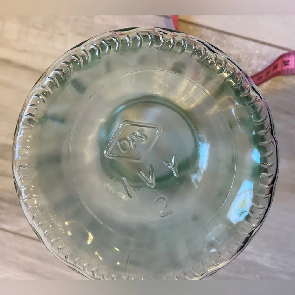 Bundle of Clear Round and Light Green Circular Textured Glass Vases
